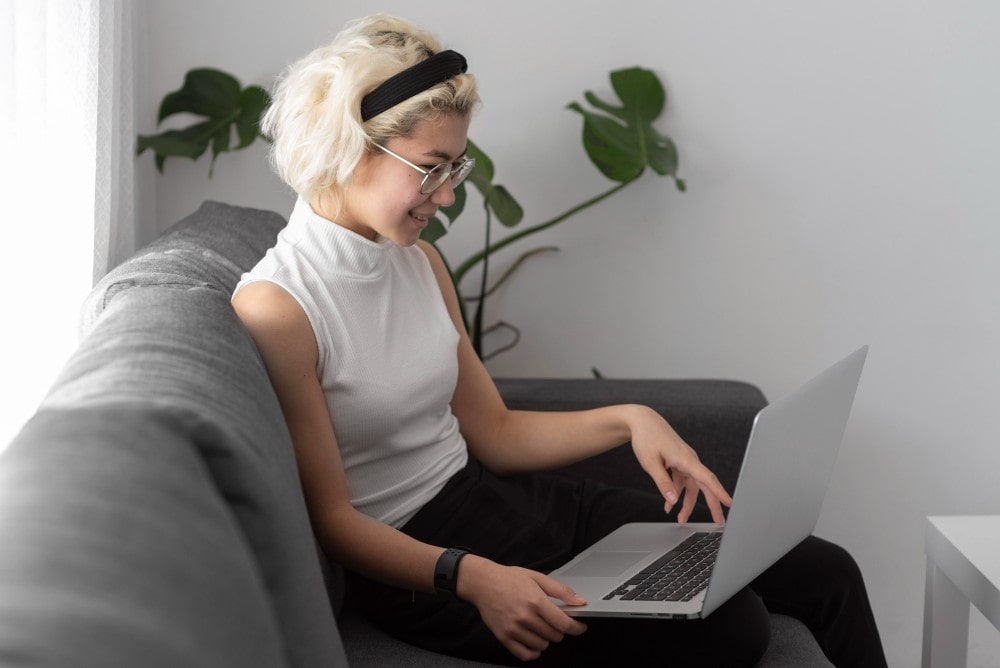 Woman having hypnotherapy via telehealth
